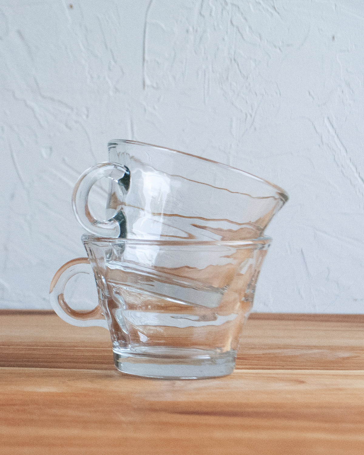 Opulent Angled Coupe Cocktail Glasses with shadow in background
