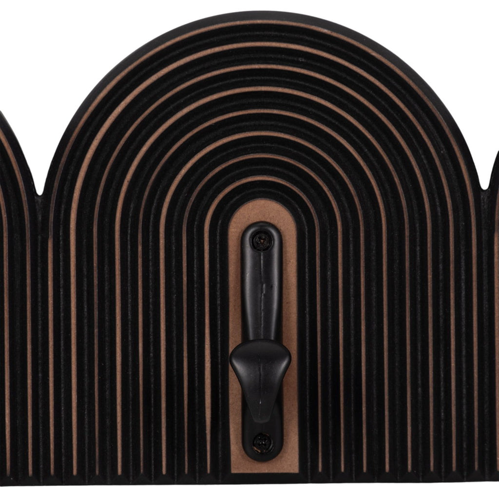 Wooden product with curved design and black hook on a white background